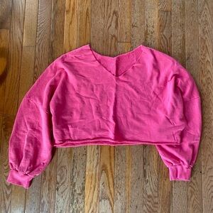 bright pink cropped off the shoulder sweater